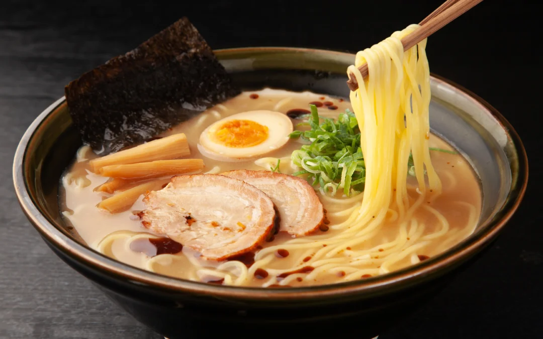 close-up of ramen in pork broth